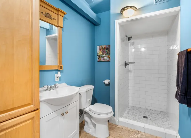 Unit B, Bathroom with full tiled shower