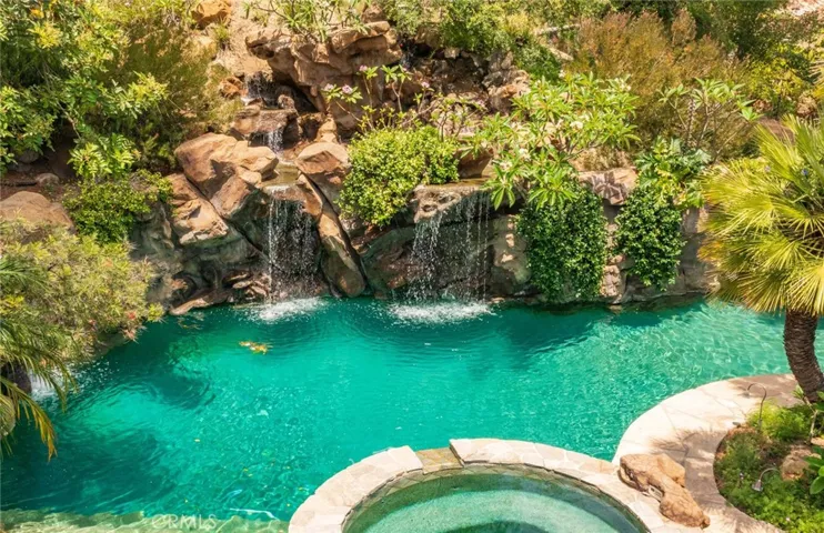 Waterfall cascades off mountain