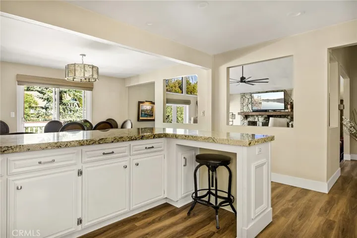 Updated Kitchen Opens to Dining and Living Roms