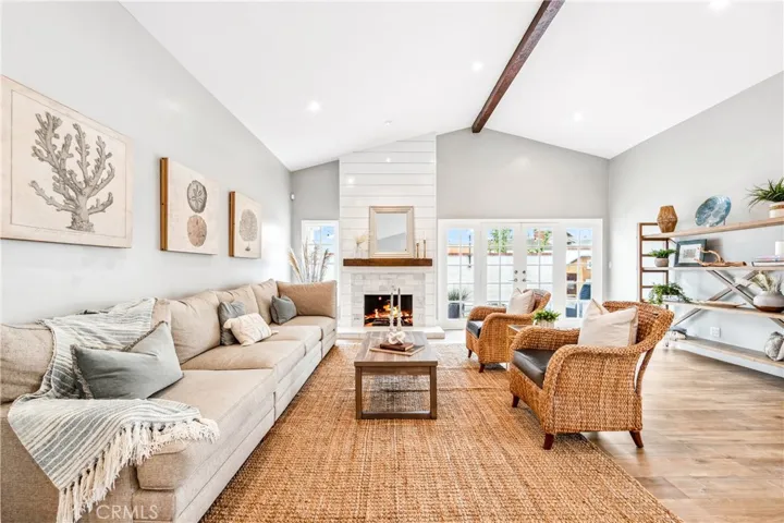 Gorgeous marble fireplace and vaulted ceiling.