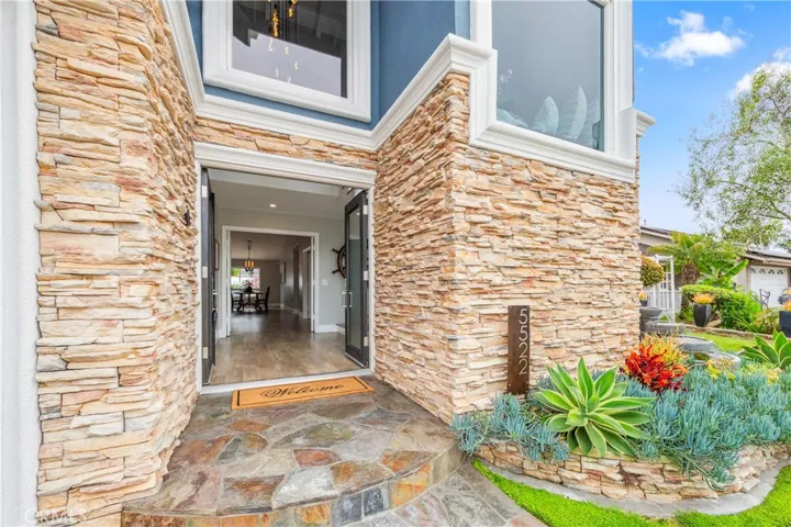 Double door entry to gorgeous foyer.