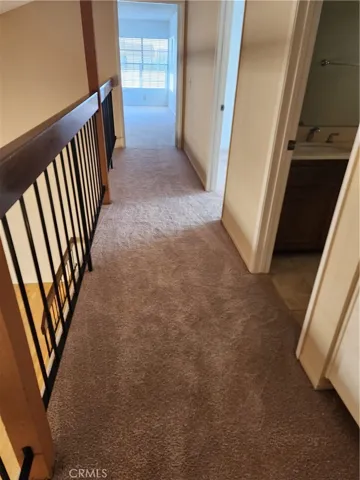 Hallway upstairs leading to bedrooms