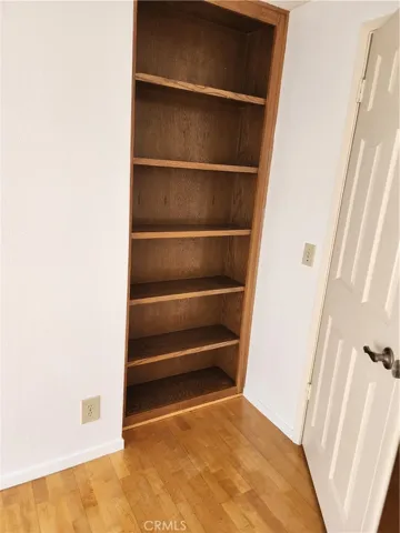 Buit in bookcase next to the bar/office