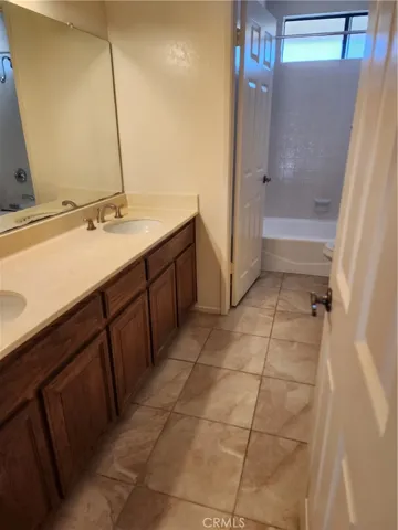 Upstairs huge  common bath with double vanity