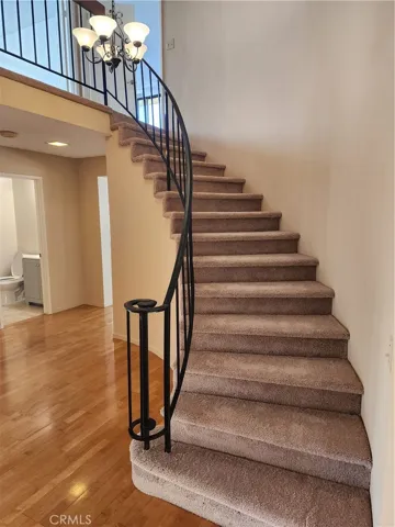 Staircase is discreetly situated for easy access