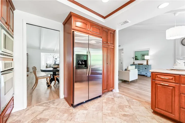 Kitchen is nicely centered between the dining room and the family room.