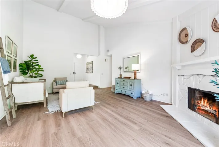Lovely family room with a stone fireplace.