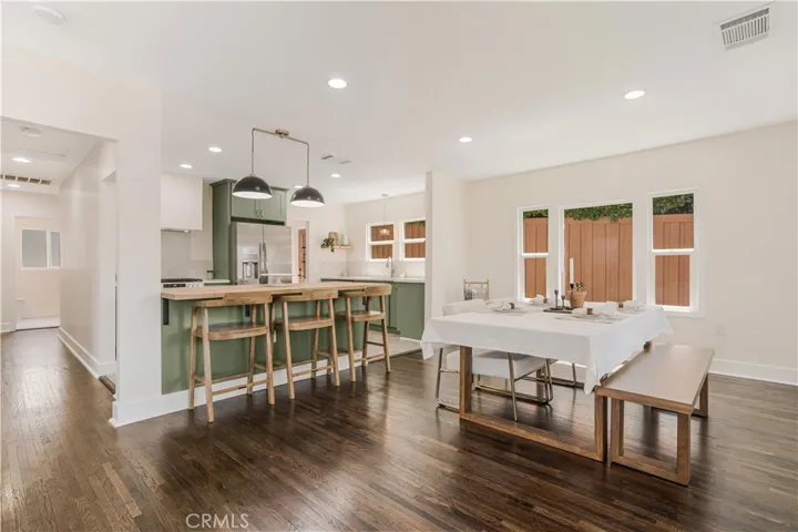 Kitchen and dining area with breakfast bar