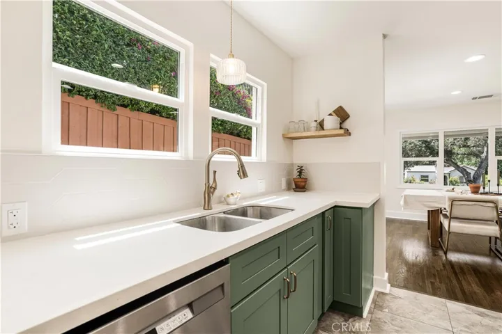 Quartz counters, new sink and fixture with large windows