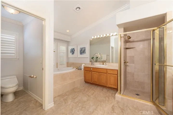 Master Bathroom with His and Her Vanities, Soaking Jetted Tub and a Separate Shower