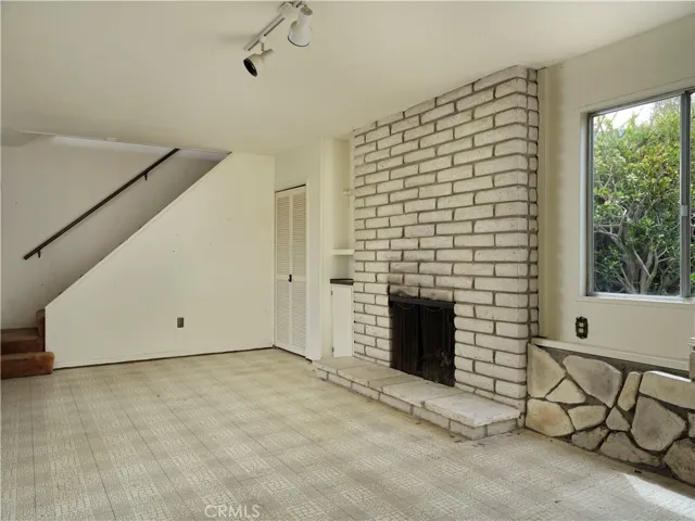 Downstairs you arrive in the Bonus Room....a future "Media Room" perhaps/ Or maybe the traditional Billiard Parlor? Imagine...