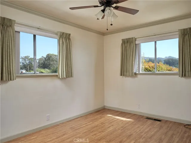 This is the Primary Bedroom which is about 12' x 12' and includes an attached 3/4 bath w/tub...