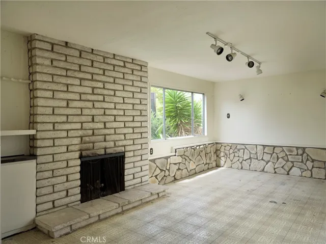 The brick chimney system features fireplaces in both the Bonus and Living Rooms!