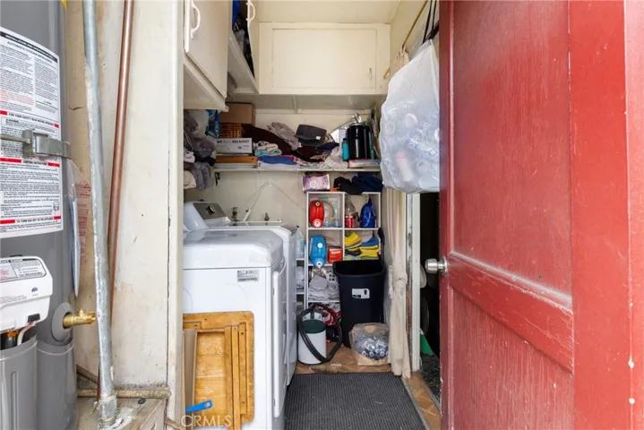 front house has side access which leads to back yard and dog run