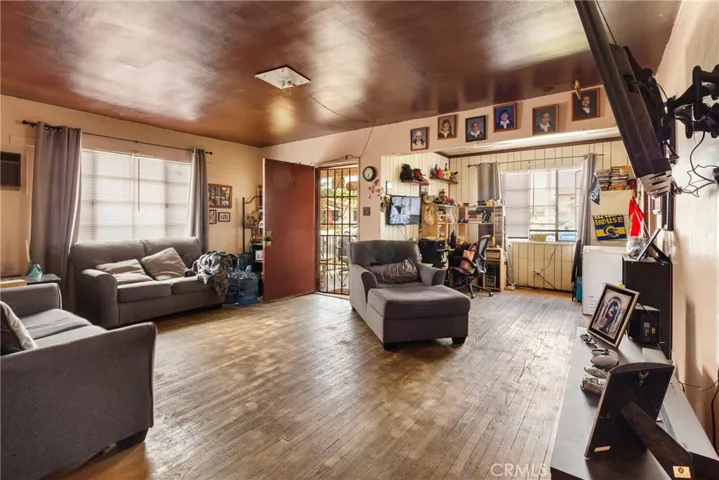 Dining area is presently being used as office .
hard wood floors through out and Natural light coming in from every direction as windows are large and plenty