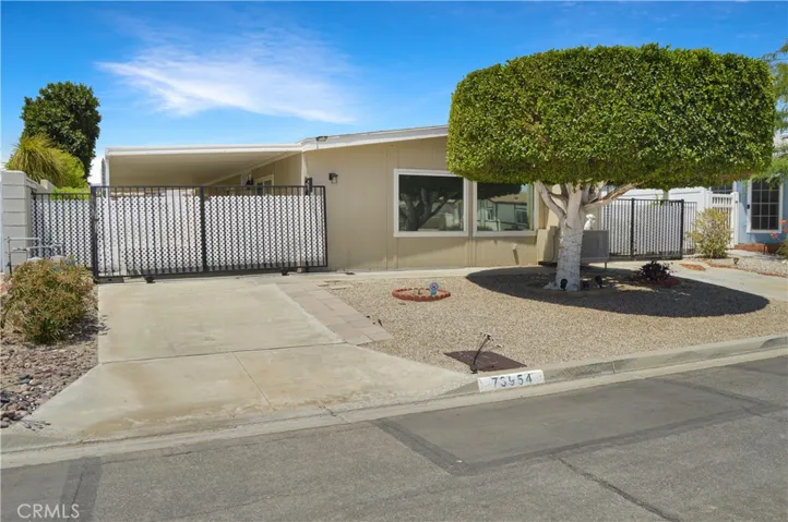 Easy-care yard and driveways on both sides!