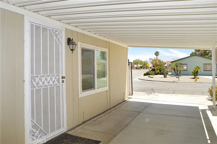Security screen and view of the neighborhood from the front door