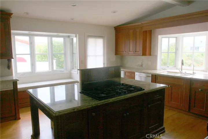 Shows range hood up
