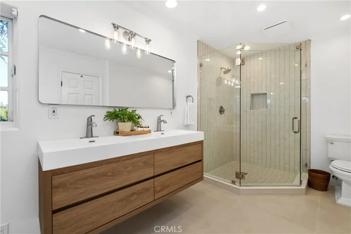 Remodeled primary bedroom with neutral luxury touches!