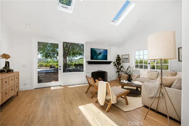 Light and bright living space with multiple skylights!