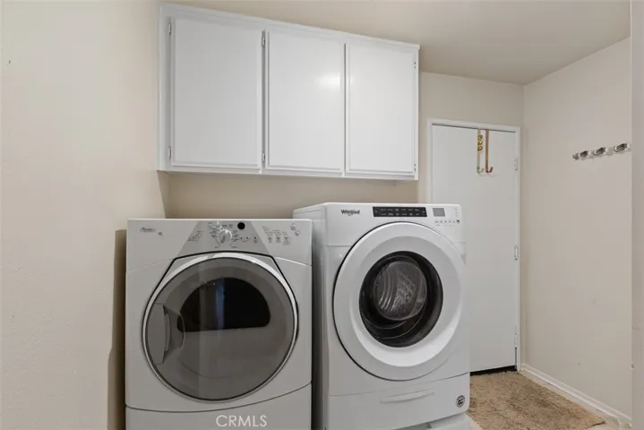 Indoor Separate Laundry Room with Washer and Dryer Included