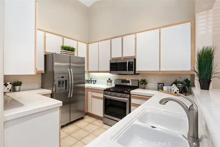 Light and Bright Kitchen includes the Refrigerator