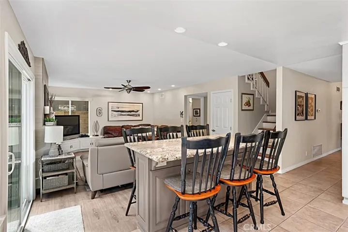 Remodeled kitchen has an open floor plan with the spacious family room.