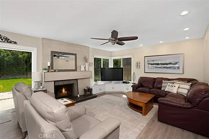 Remodeled family room with custom fireplace.