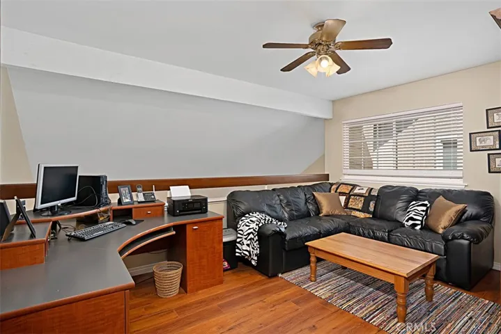 Large loft with gorgeous flooring.