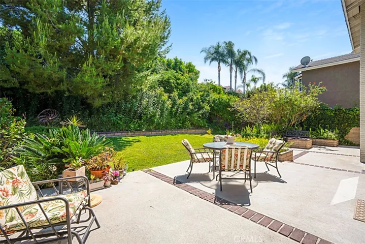 Enjoy the large patio and private backyard.