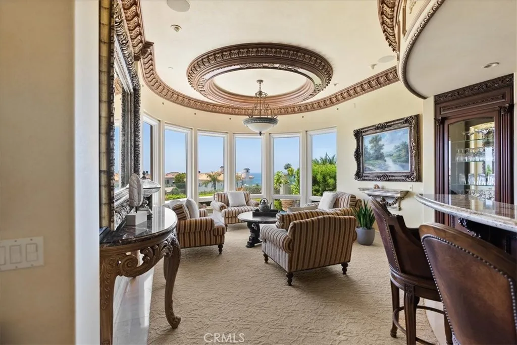 Wet Bar and Sitting Area with lovely windows to take in those ocean views!