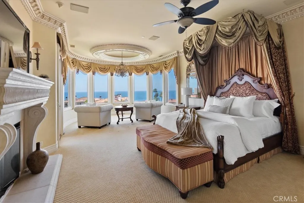 Primary Bedroom is incredibly spacious and includes fireplace, sitting room, and deck with ocean views!