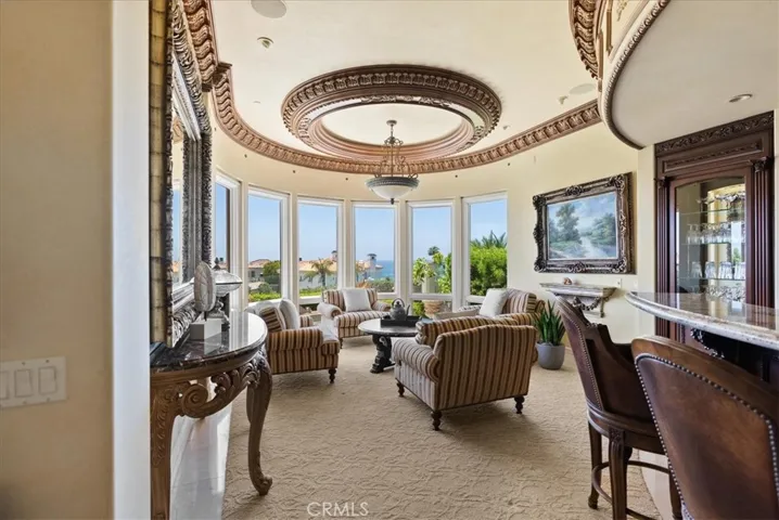 Wet Bar and Sitting Area with lovely windows to take in those ocean views!