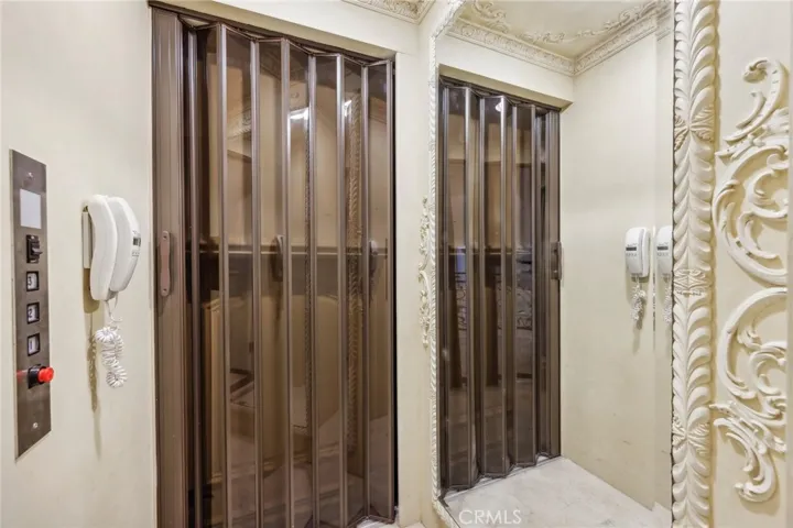 Elevator to 3 levels - 2 stories and step-down to garage.
