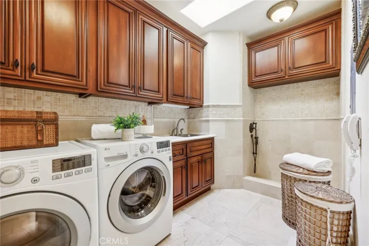 Second Floor Laundry Room with pet shower.