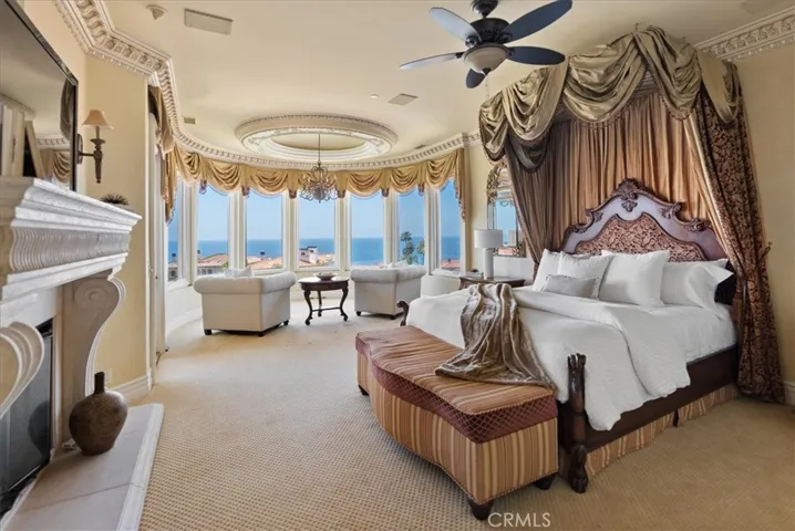 Primary Bedroom is incredibly spacious and includes fireplace, sitting room, and deck with ocean views!