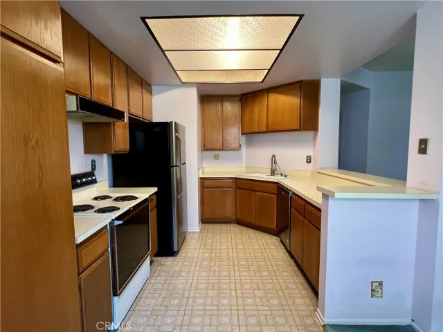 Kitchen - Open to living and dining space.