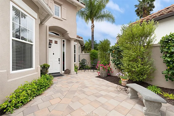 Gated courtyard entry.
