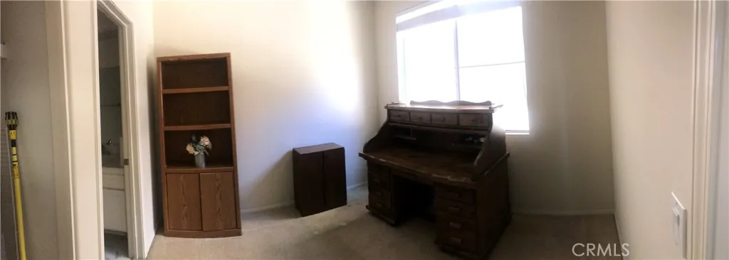 2nd master being used as an office with lots of storage...