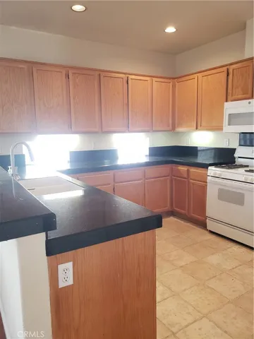 Kitchen showing a small portion of the breakfast bar