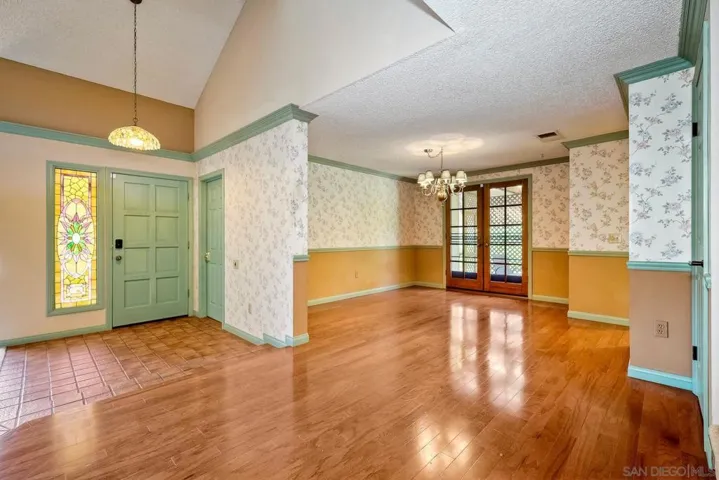 Views to dining room and entry
