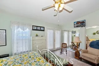 Primary Suite with French Doors Leading to Patio