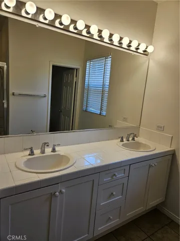 Well-lit double vanity.