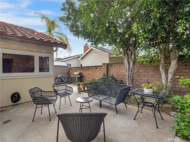 Backyard Seating Area w/ Market Lights