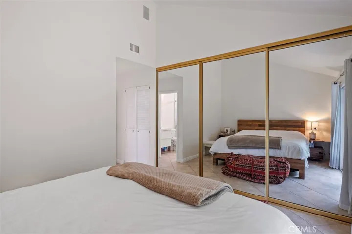 Master Bedroom w/ Mirrored Closet Doors