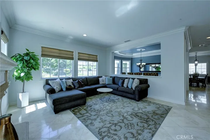 Your view from the family room to the formal dining room and onto the kitchen and casual dining.