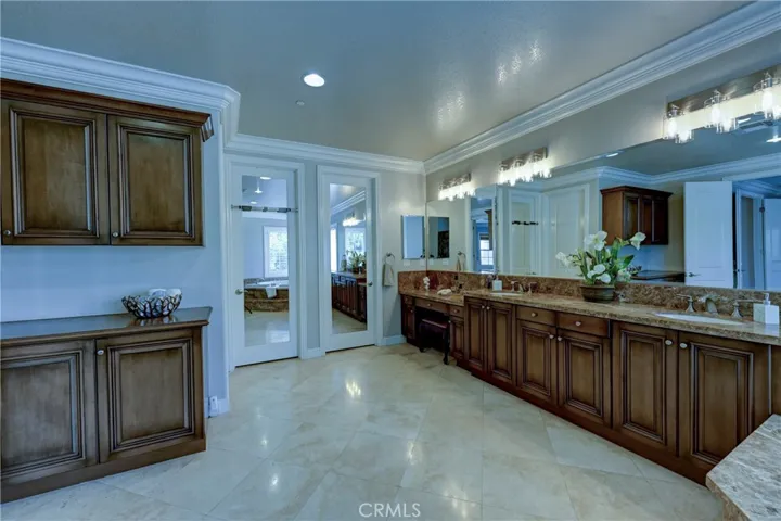 Spacious ensuite bath has 2 separate walk in closets and a linen closet to the left of this photo.