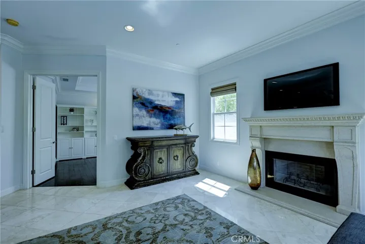 The family room looking toward the double doors of the office / music room or library.
