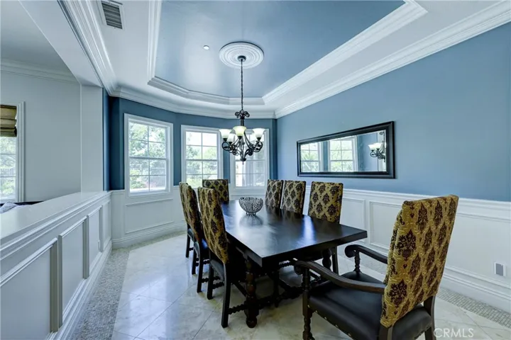 Note the coffered ceiling in the formal dining room.