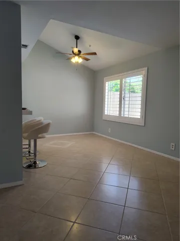 Dining room with soaring ceilings and room for dining table plus hutch or shelving